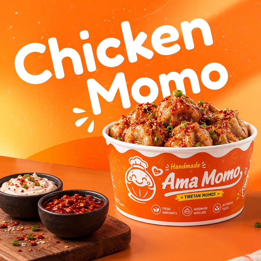 Steamed chicken momo in an Ama Momo bowl with mayo and chilli sauce